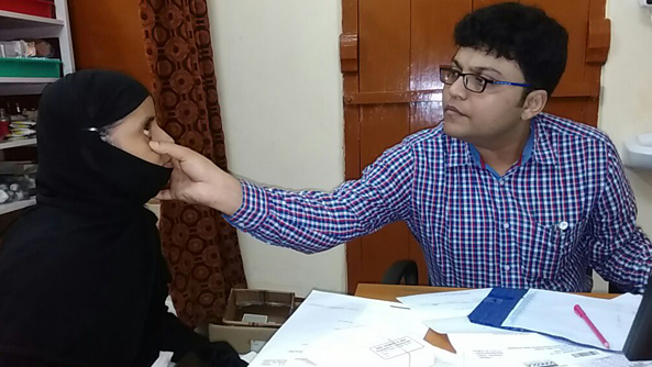 Doctor examining patient